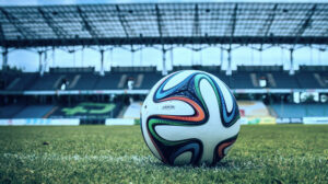 Fútbol-Balón-Fondo-Estadio